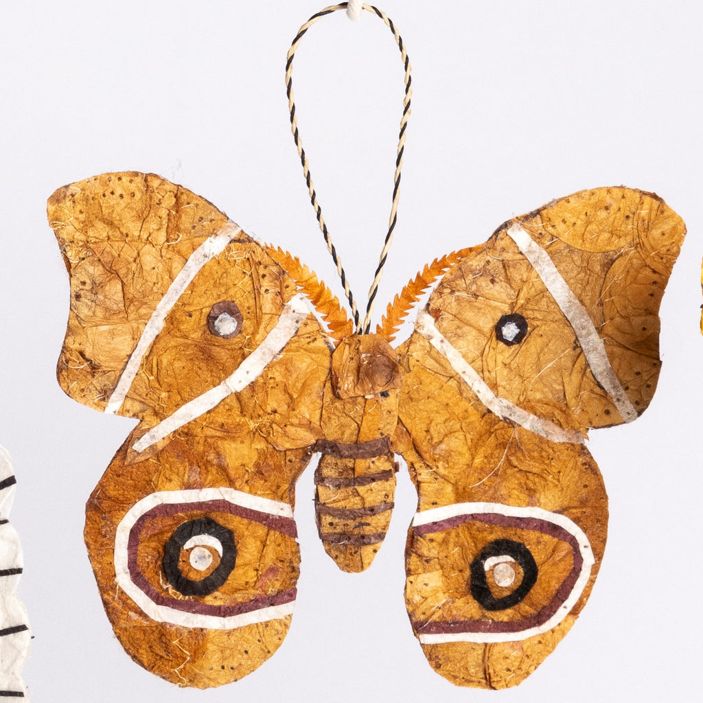 Handmade ethically sourced fair trade Madagascar silk holiday ornament or small unique hanging wall decor wall art golden tan light brown