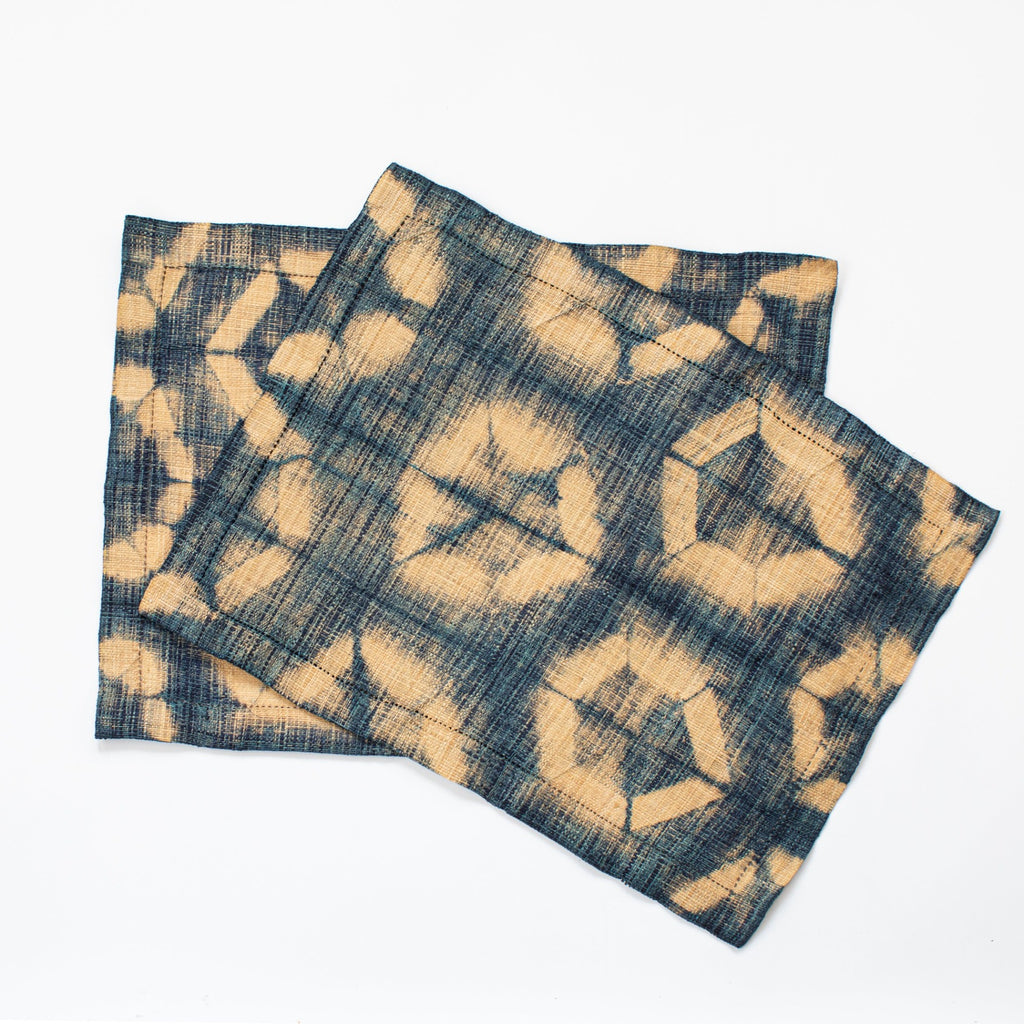 Ethically sourced fair trade rainforest friendly Madagascar raffia rectangular placemats (set of two) indigo blue and natural tan colored batik dyed table linens home decor modern rustic