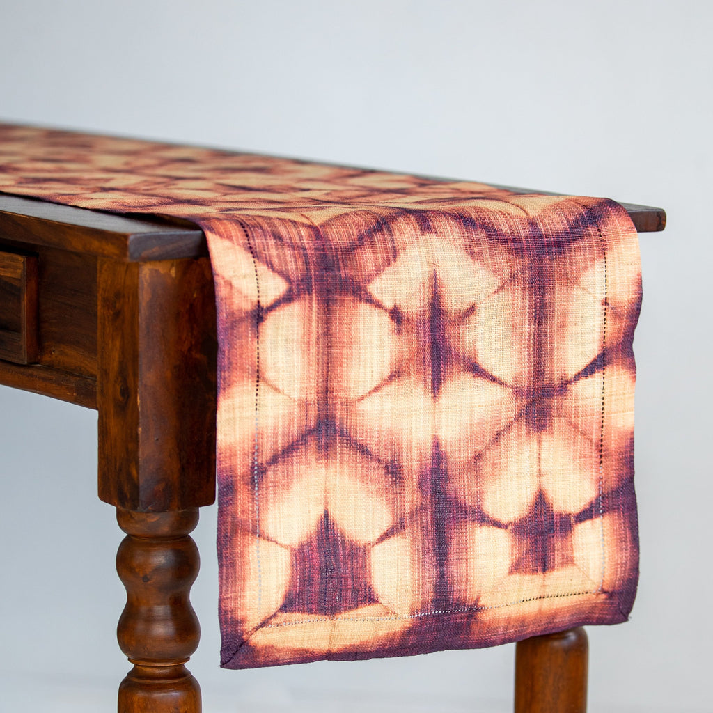 Ethically made handmade fair trade Madagascar raffia table runner burgundy wine red and tan natural linen color shibori dyed home decor modern rustic