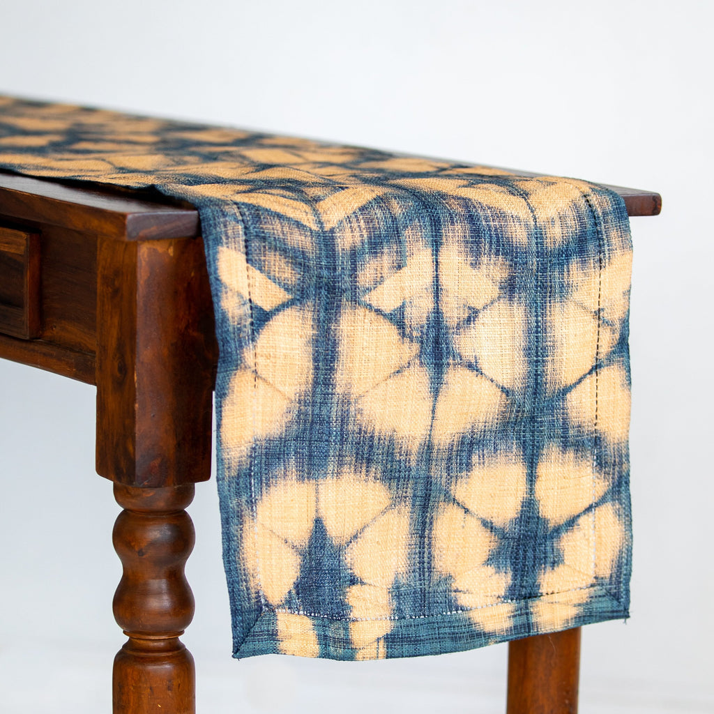Ethically made handmade fair trade Madagascar raffia table runner indigo navy blue and tan natural linen color shibori dyed home decor modern rustic