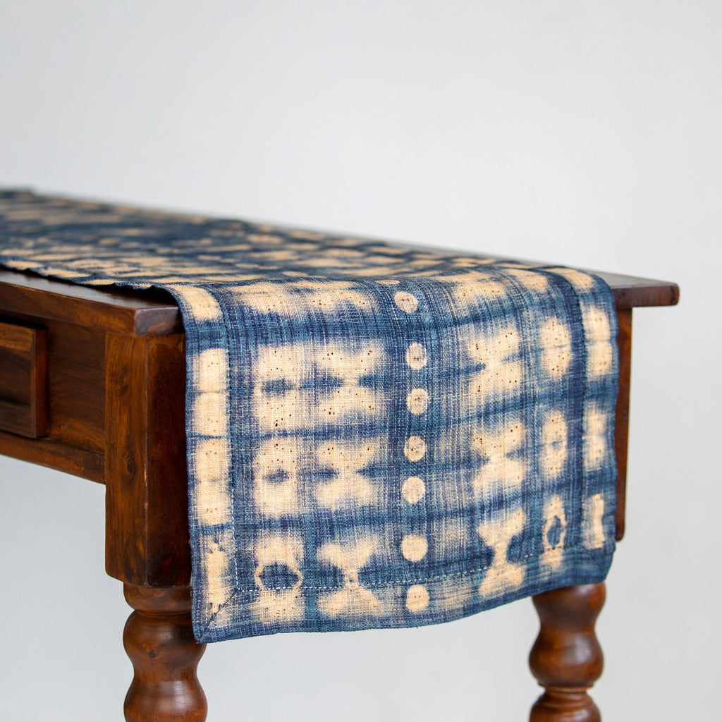 Handmade fair trade Madagascar raffia table runner indigo navy blue and natural tan ivory shibori dye pattern home decor modern rustic