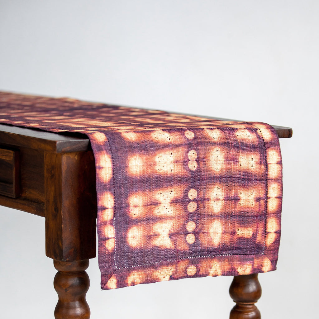Ethically made fair trade handmade Madagascar raffia table runner burgundy maroon rich red and tan linen color earthy colors home decor modern rustic