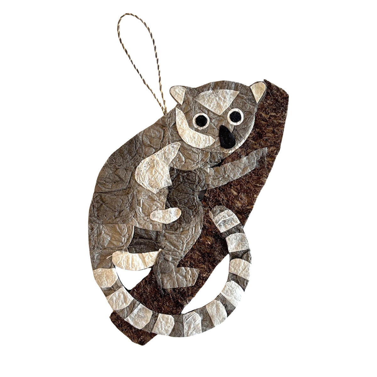 Handmade silk ornament depicting baby ring-tailed lemur.  Perfect gift for an animal-lover.  Made from sustainably sourced raffia fiber and silk cocoons.  Fair trade certified.  Made in Madagascar.