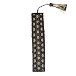 Handwoven raffia bookmark with pattern of charcoal, black, and light tan. Fair trade, handmade, sustainably sourced raw materials. Great gift for a man or woman.