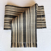 Handwoven Madagascar raffia table runner, black and natural linen-colored stripe, handwoven patterning, Betsimisaraka stripe pattern, fair trade eco-friendly wildlife friendly home decor
