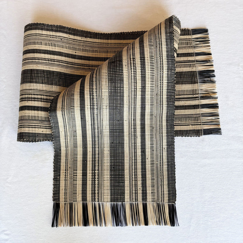 Handwoven Madagascar raffia table runner, black and natural linen-colored stripe, handwoven patterning, Betsimisaraka stripe pattern, fair trade eco-friendly wildlife friendly home decor