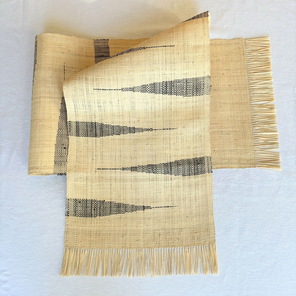 Handwoven Madagascar raffia table runner, black and natural chevron zig zag, handwoven patterning, interlocking weft clasping technique, fair trade eco-friendly wildlife friendly home decor