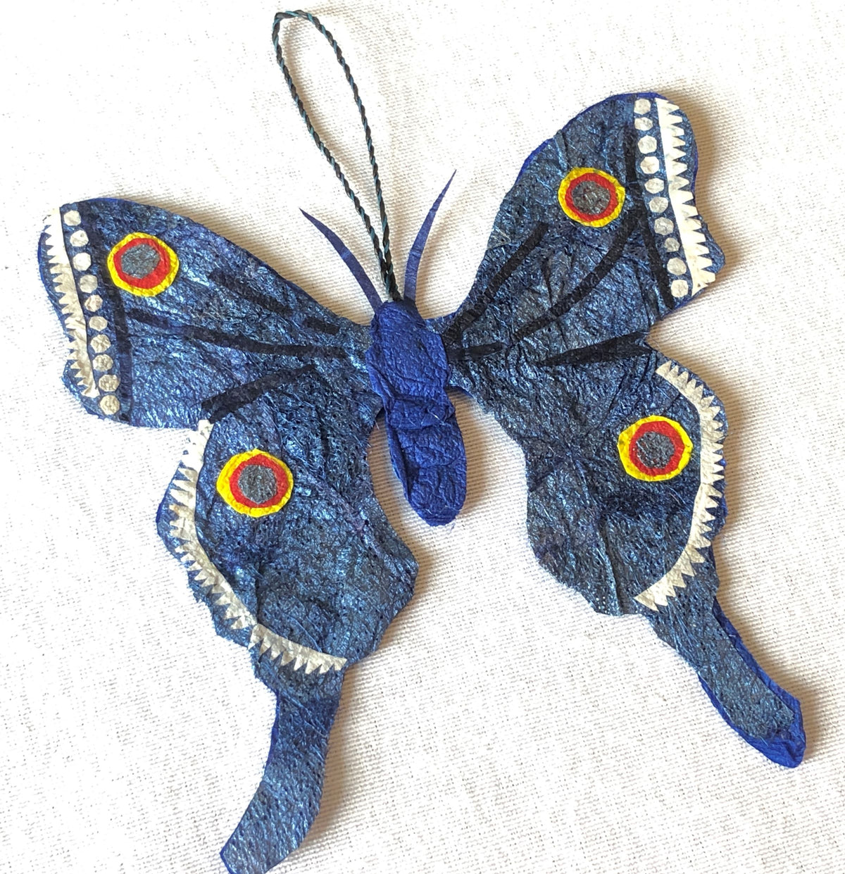 Fair trade handmade ethically made ecofriendly Madagascar silk holiday christmas ornament, small unique wall decor, indigo navy blue and white butterfly ornament mini artwork