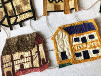 Handmade collage wall hanging artwork colorful village houses, 24"x24" intricate detail, Madagascar cocoon silk and raffia, one of a kind original. 