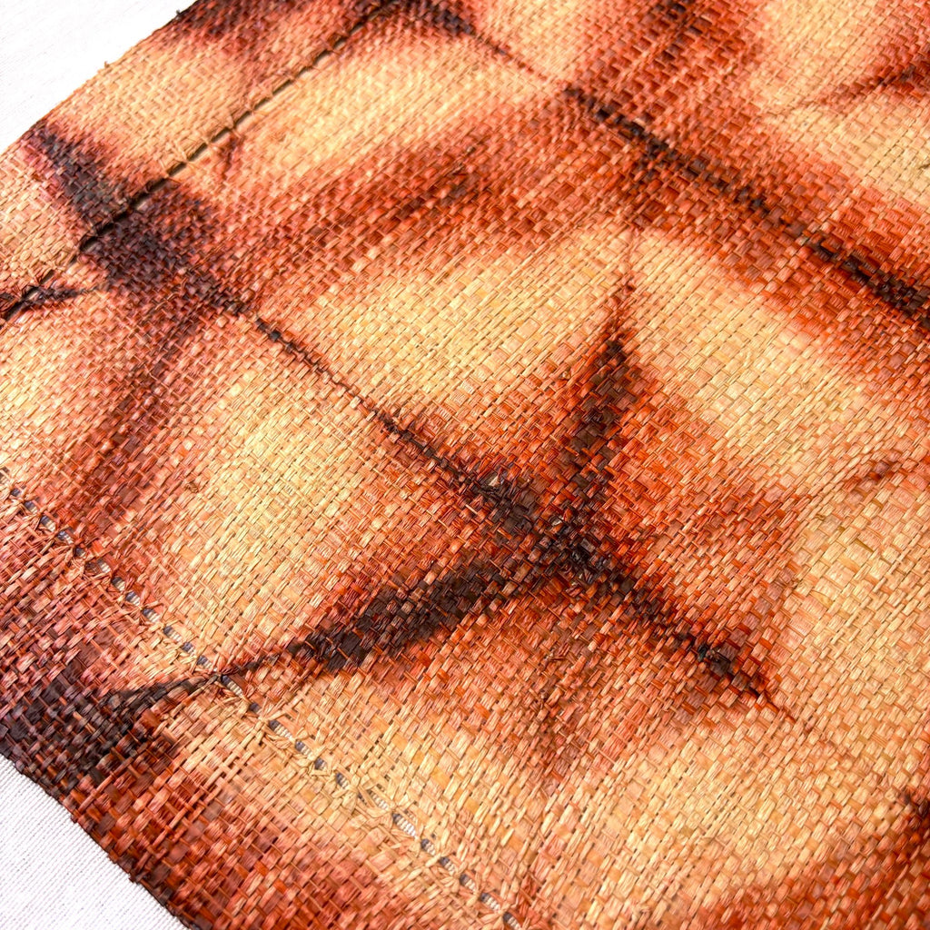 Ethically made fair trade handmade Madagascar raffia placemats, shibori dyed hexagon pattern, warm earthy rust coral red and tan linen color earthy colors home decor modern rustic, 14"x19"