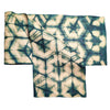 Ethically made handmade fair trade Madagascar raffia table runner verdant grass green and tan natural linen color shibori dyed home decor, modern rustic nature-inspired table decor, hexagon patterned