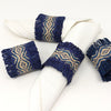 Handwoven raffia napkin ring set of 4, fair trade, wildlife friendly, ecofriendly, handmade, coastal navy blue and natural, home decor, table decor.