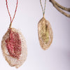 Ethically made hand crafted fair trade wild Madagascar silk cocoon holiday christmas tree ornament - red and gold