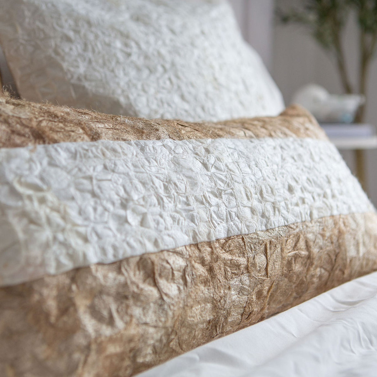 Fair trade handmade silk cocoon throw pillow 12"x24" linen-colored and white Madagascar silk