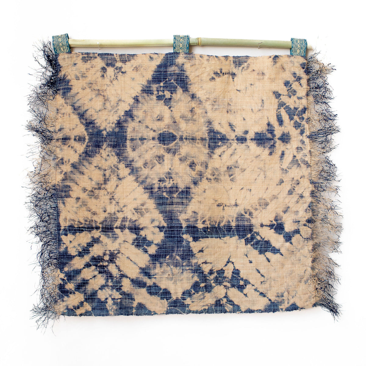 Ethically made fair trade handmade woven wall art wall hanging wall decor 24"x24" batik dyed tie-dyed Madagascar raffia denim navy indigo blue