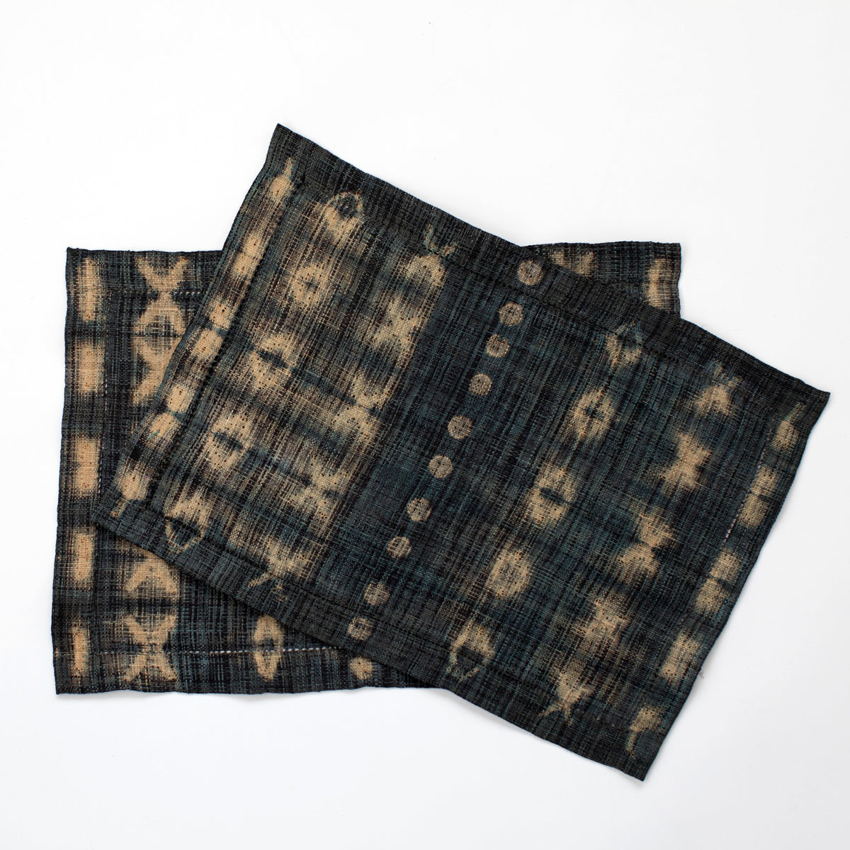 Black charcoal and tan rectangular batik dyed raffia placemats Madagascar handmade fair trade ethically sourced home decor modern rustic
