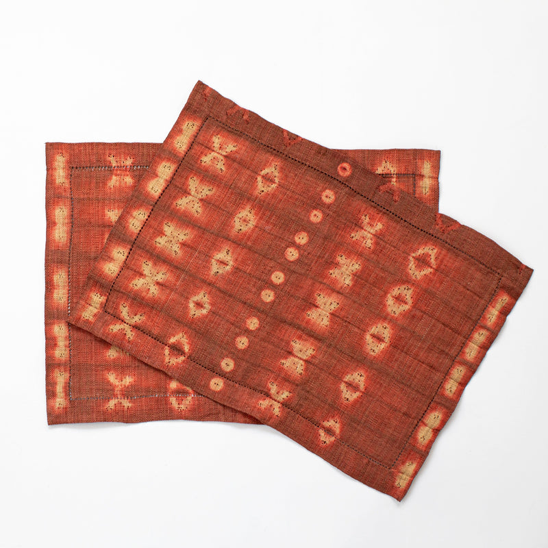 Ethically sourced fair trade Madagascar raffia placemats (set of two) terra cotta orange rust and tan colored rectangular batik dyed home decor modern rustic table linens
