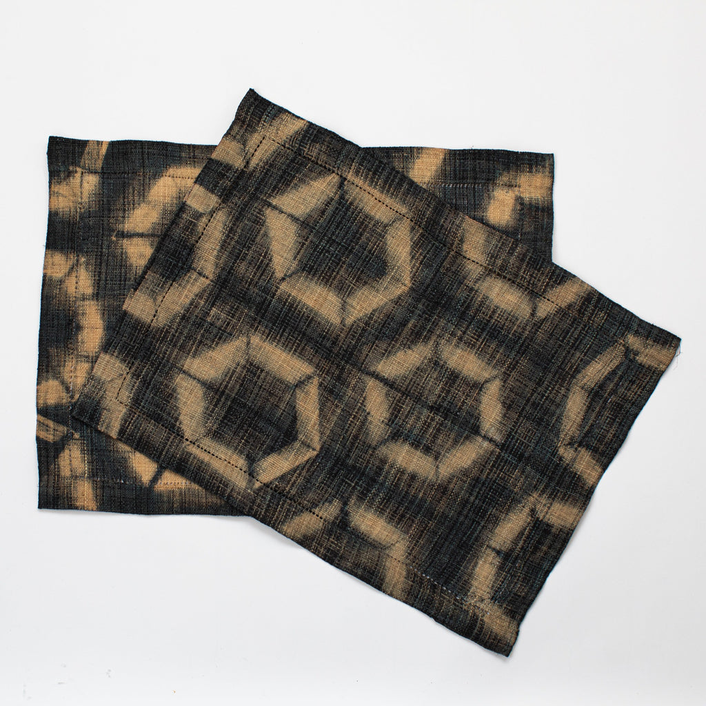 Ethically sourced fair trade environmentally friendly Madagascar raffia rectangular placemats (set of two) textured charcoal black and tan colored batik dyed table linens home decor modern rustic