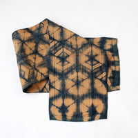 Ethically made handmade fair trade Madagascar raffia table runner indigo navy blue and tan natural linen color shibori dyed home decor modern rustic